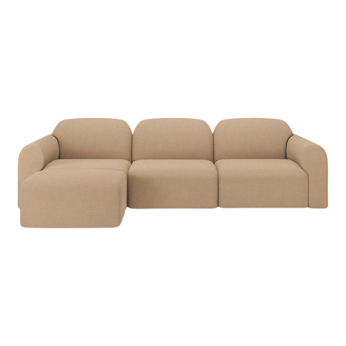 Beige upholstered sectional sofa with a minimalist design and soft, textured fabric for a cozy feel.