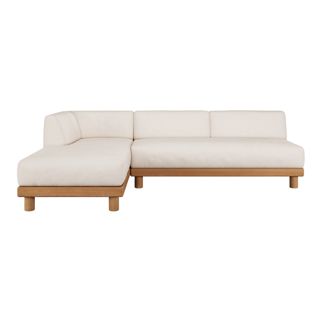 Modern L-shaped sofa in soft beige upholstery with natural wood legs, featuring a clean, minimalist design.