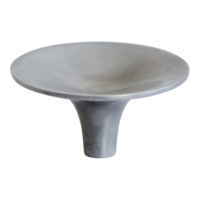 "Round gray concrete bowl with a smooth finish and tapered pedestal base, showcasing a minimalist design."