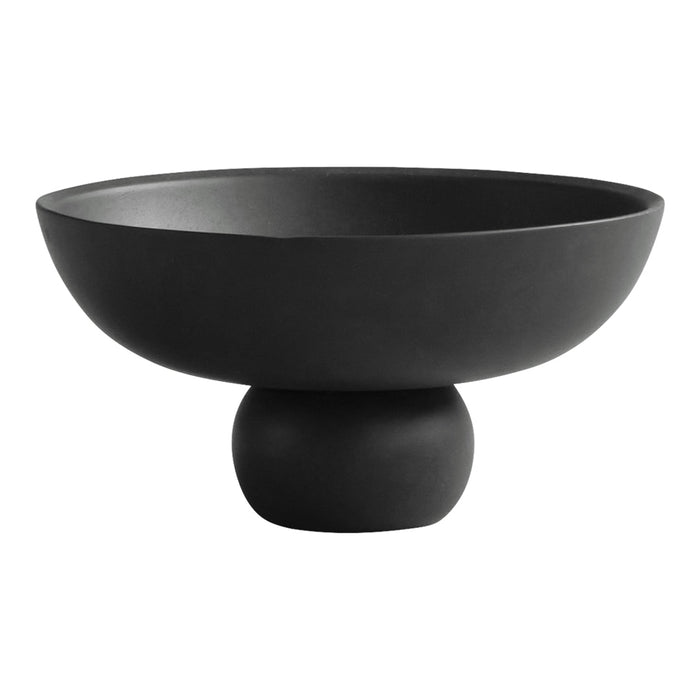 Black ceramic bowl on a round pedestal, featuring a matte finish and smooth, modern design. Perfect for minimalist decor.