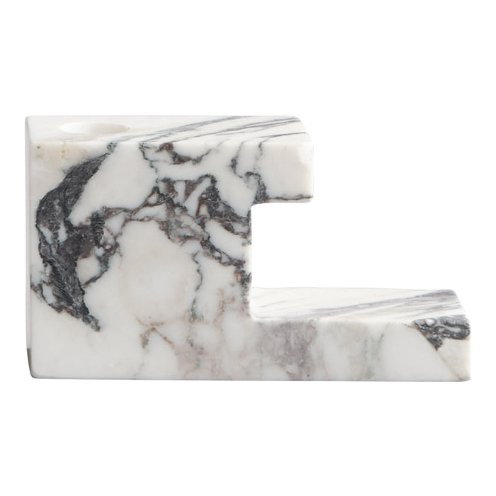 White marble bookend with intricate gray and black veining patterns, adding elegance to any bookshelf.