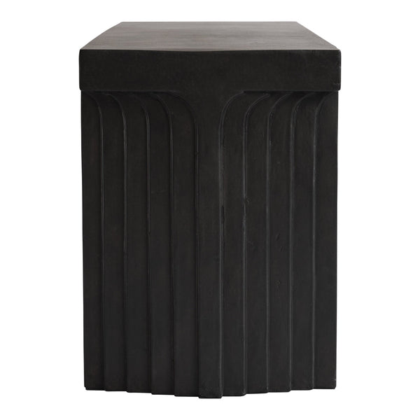 Black textured hexagonal stool with ribbed design, perfect for modern decor.
