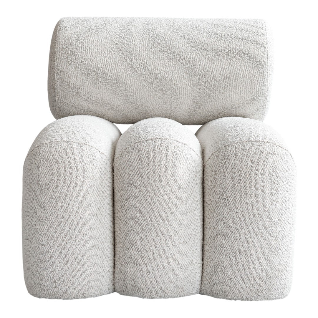 Cream textured cushion chair with rounded edges and a soft, cozy pattern. Perfect for modern living spaces.