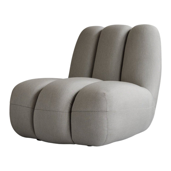 Light gray modern chair with soft fabric, featuring a smooth, minimalistic design and rounded, ribbed patterns.