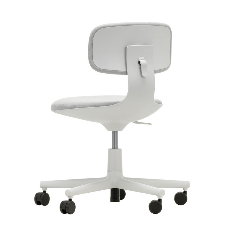 White ergonomic office chair with a smooth, minimalist design and sleek wheels for easy mobility.