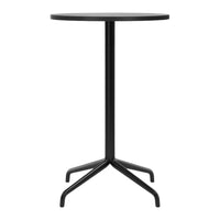 Stylish black round table with a sleek metal base, perfect for modern decor. Ideal for small spaces or outdoor use.