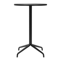 Sleek black round table with a minimalist design and sturdy tripod base, perfect for modern spaces.