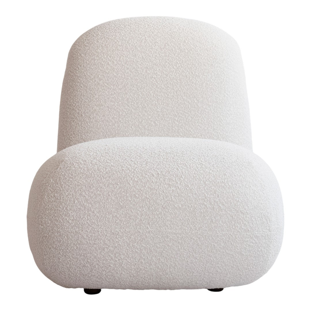 Textured off-white upholstered chair with soft, rounded shapes and a minimalist design. Ideal for modern decor.