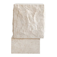 Two textured stone blocks in creamy beige with natural flecks, showcasing a rugged, minimalist design.