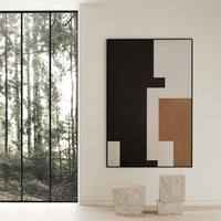 Abstract wall art featuring black, white, and brown geometric patterns for a modern aesthetic.