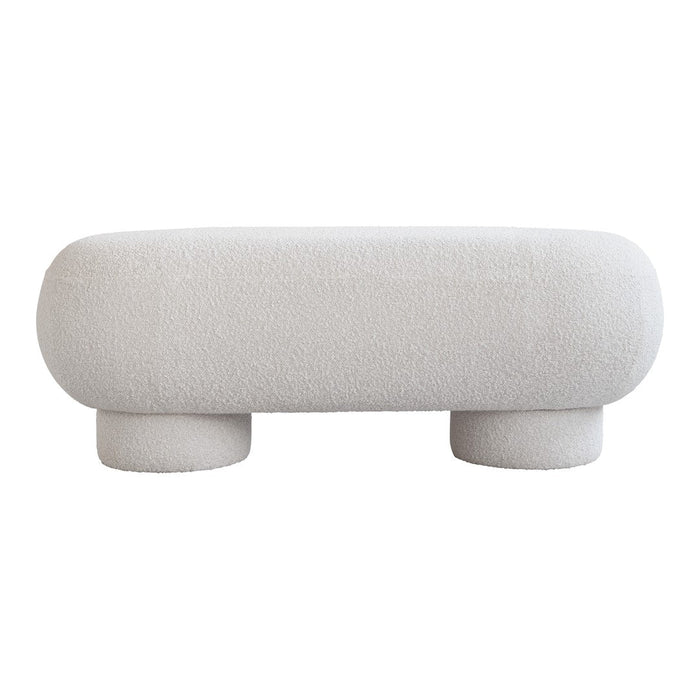 White boucle ottoman with textured pattern and rounded form, featuring soft, cozy fabric design.