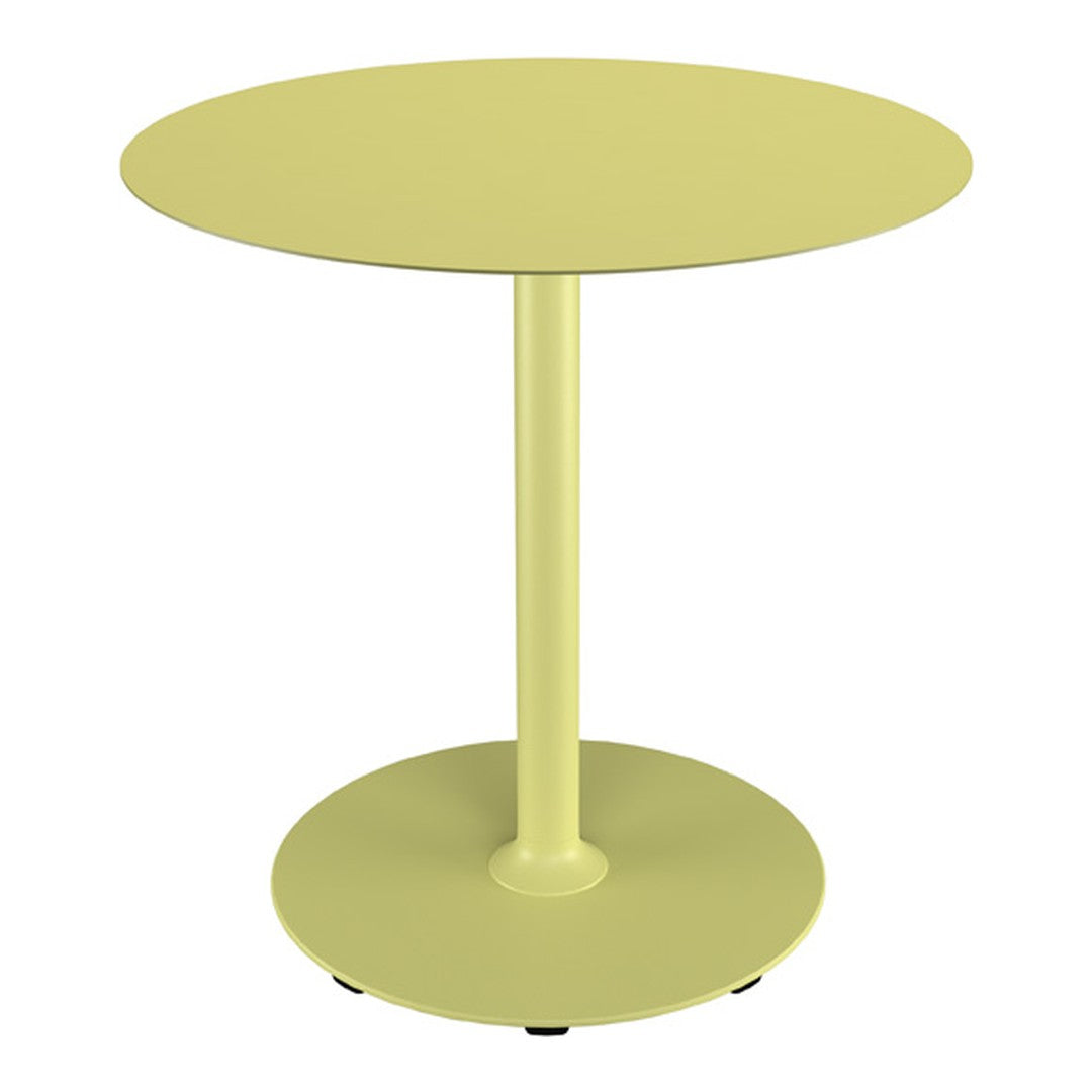 Round table in soft lemon yellow with a minimalist design and smooth surface. Perfect for modern decor.