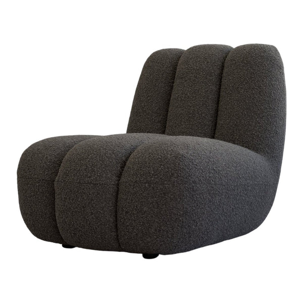 Stylish gray upholstered chair with a textured, cozy pattern and soft, rounded shapes. Ideal for modern decor.