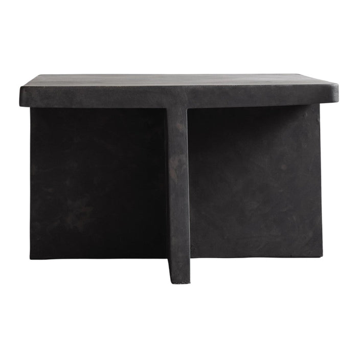 Black concrete table with a smooth, matte finish and minimalist design, perfect for modern decor.