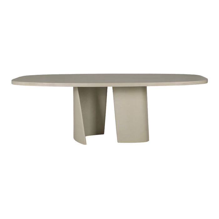 "Neutral taupe oval dining table with smooth surface and minimalist design, featuring geometric bases."