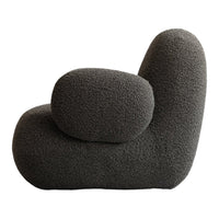 Textured charcoal gray seating in an abstract, modern shape, perfect for contemporary interiors.