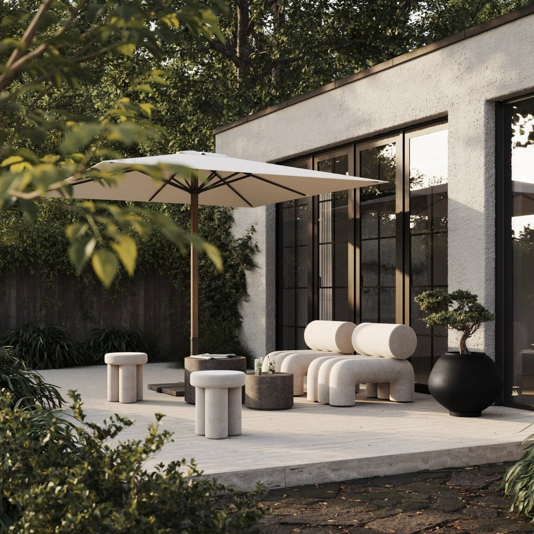 Minimalist outdoor seating in soft beige and gray tones, featuring sleek shapes and natural textures. Elegant design.