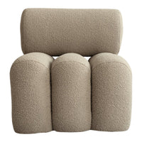 Beige textured chair with rounded shapes and soft, cozy fabric pattern. Perfect for modern interior decor.