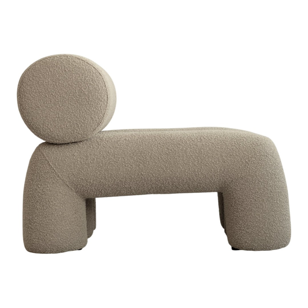 Beige textured bench with a rounded backrest, featuring a modern, minimalist design for stylish decor.