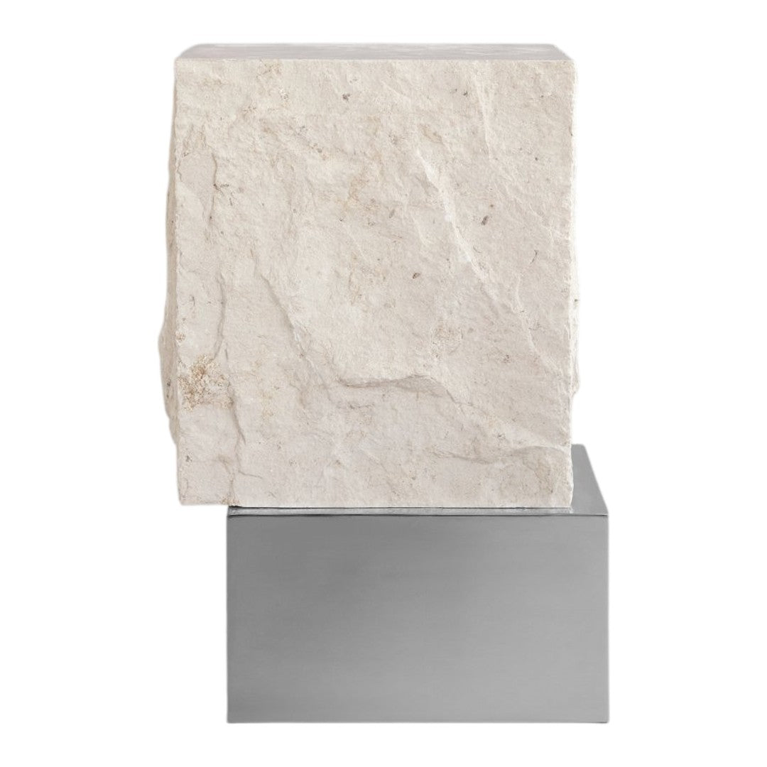 Textured white stone atop a sleek silver metal base, combining natural and modern design elements.