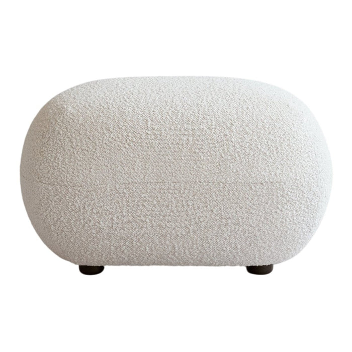 Textured off-white pouf with a soft, neutral palette. Perfect for minimalist and contemporary decor.