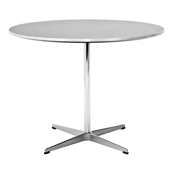 Round silver table with a sleek, polished chrome base and smooth top, perfect for modern spaces.