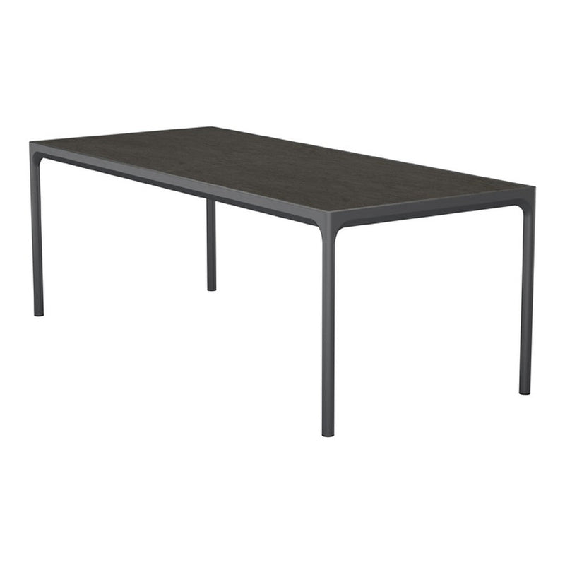 Modern rectangular dining table in sleek black finish with minimalist design and smooth surface. Perfect for any decor.