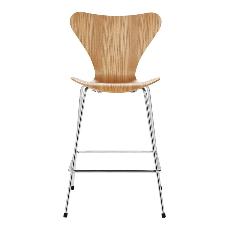 Wooden chair with a natural light wood finish and sleek chrome legs, featuring a smooth, modern design.