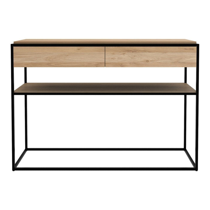 Natural wood finish with a sleek black frame; minimalist design featuring two drawers and an open shelf.