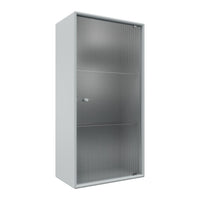 Grey metal cabinet with sleek, textured vertical lines and a minimalist design featuring a single door.