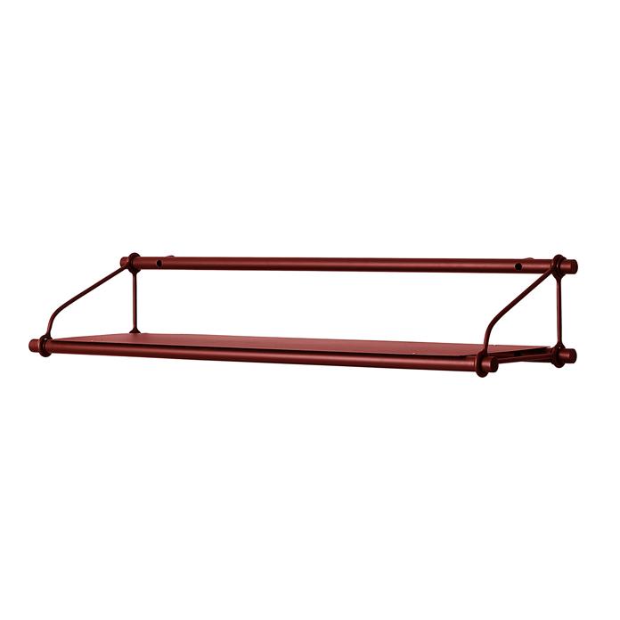 "Rustic red metal shelf with a sleek, minimalist design and sturdy pipe-style supports."