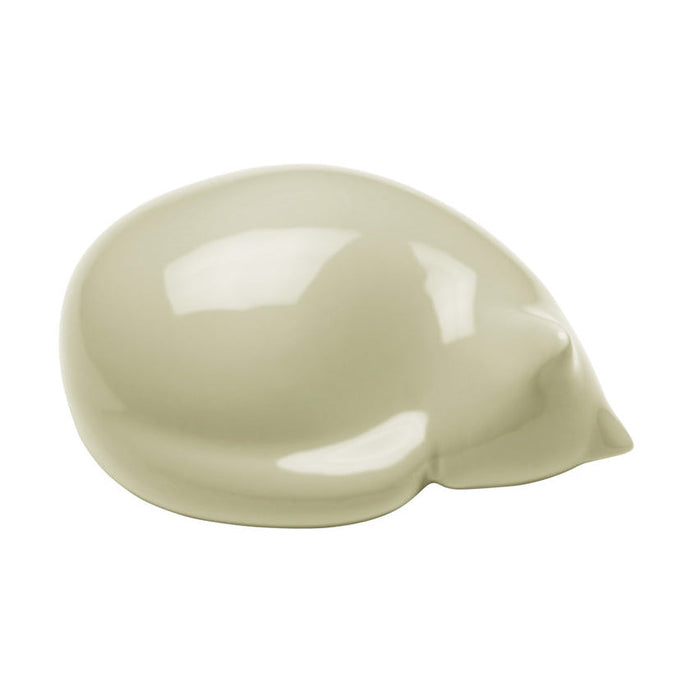 Soft sage green ceramic dish with a smooth, glossy finish and a unique petal shape. Perfect for decorative use.