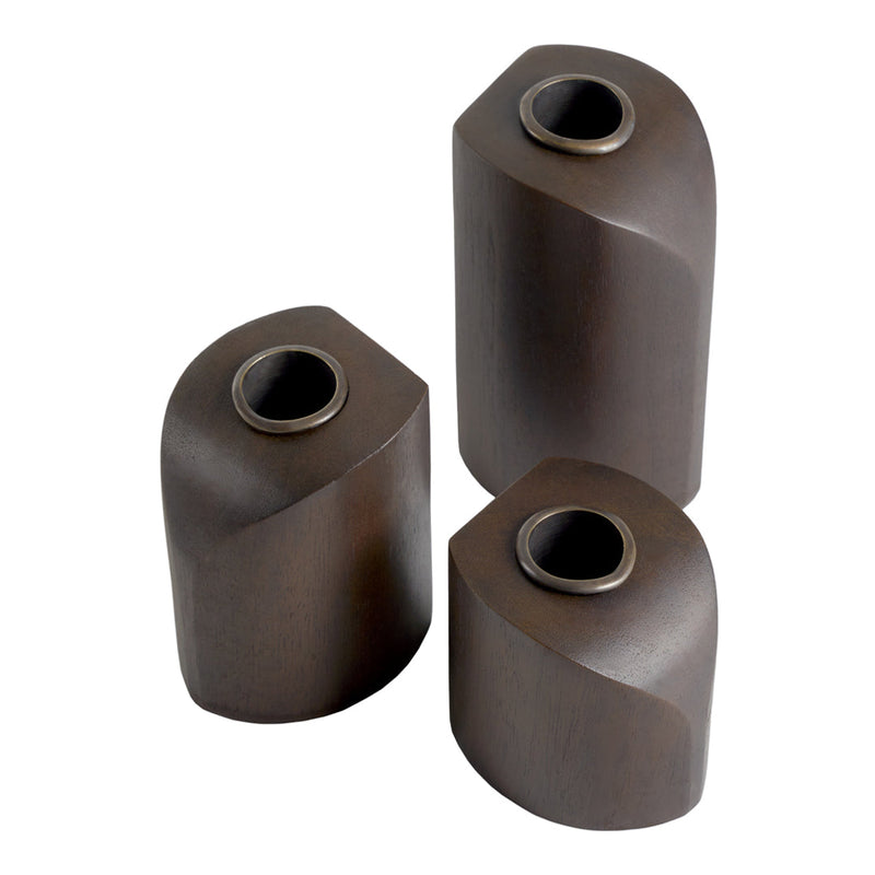 Set of three modern, dark brown vases with smooth, curved shapes and contrasting metallic openings.