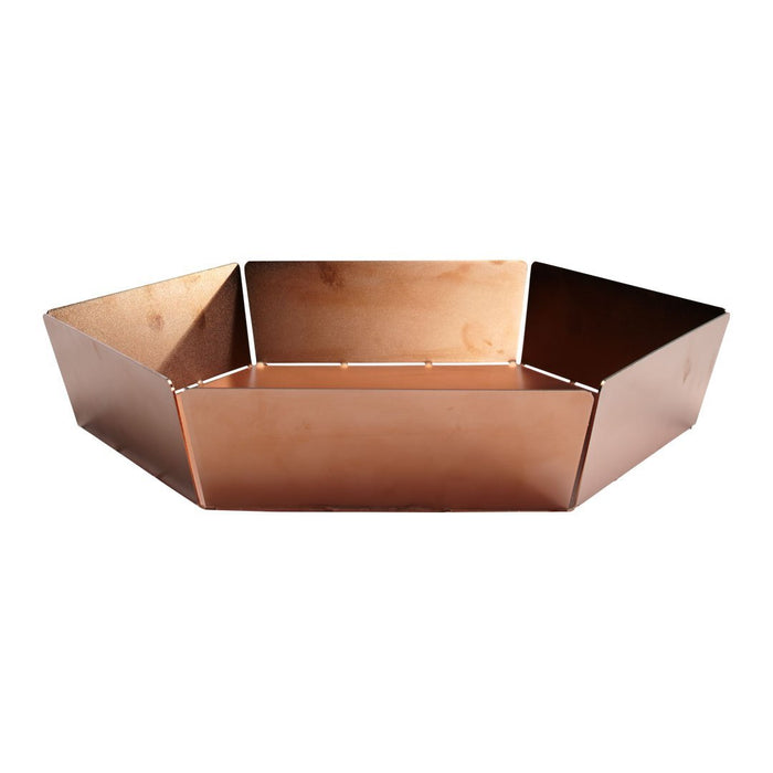 Geometric copper hexagonal tray with a smooth, reflective surface and subtle metallic sheen.