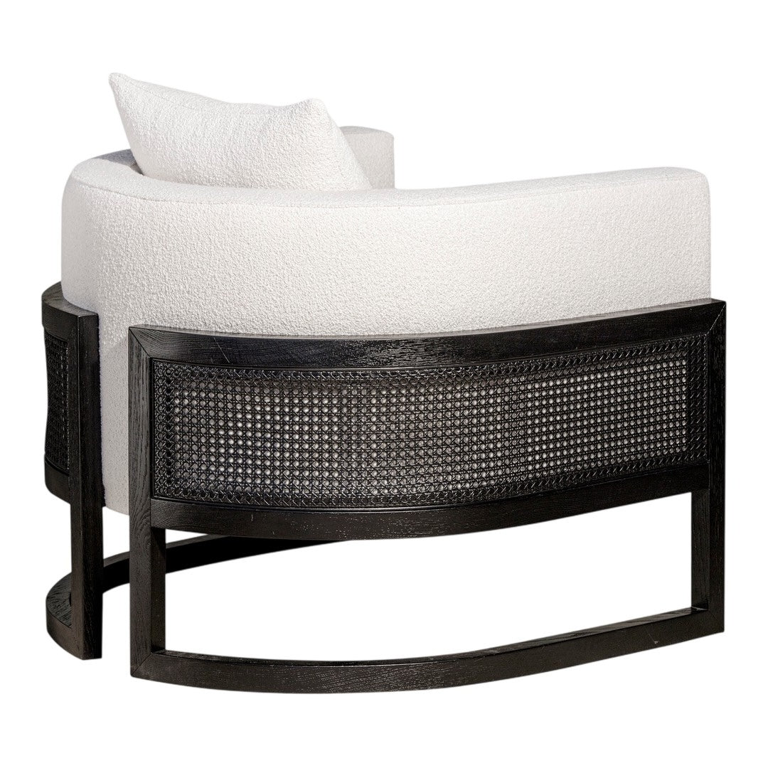 White textured upholstery with a curved black cane frame and subtle woven pattern. Elegant and modern design.