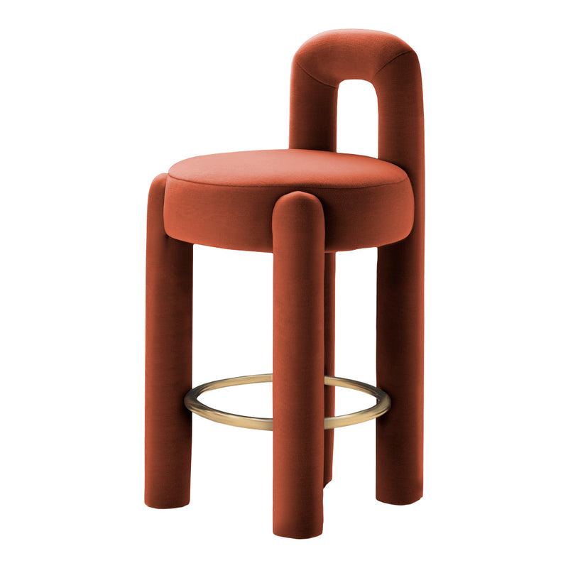 Rust-colored velvet stool with smooth, rounded edges and a sleek gold ring base, perfect for modern decor.