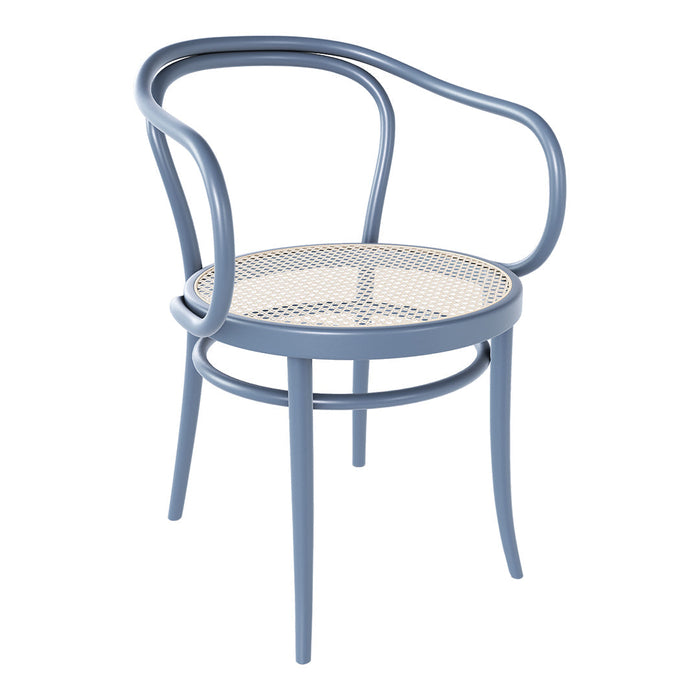 Light blue curved armchair with a woven rattan seat, featuring a vintage-inspired design and elegant silhouette.
