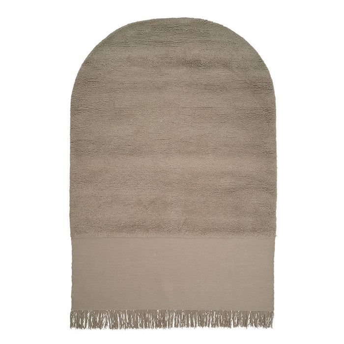 Soft beige rug with a subtle gradient pattern and fringed edges, ideal for a cozy, stylish home decor.