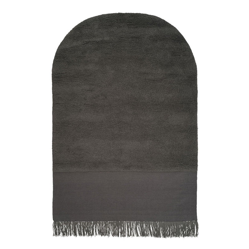 Gray plush towel with a solid dark gray bottom and fringed edges. Smooth texture and elegant arch shape.