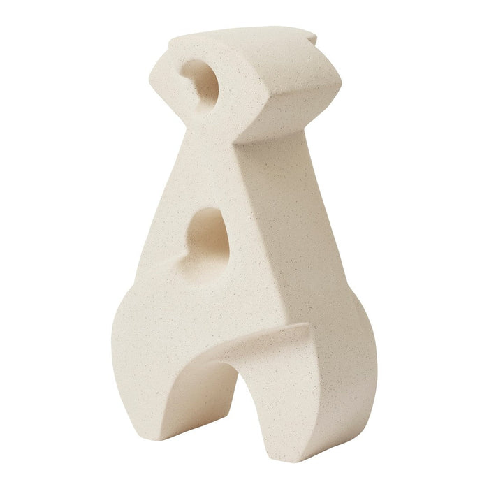 Off-white decorative sculpture with a smooth, matte finish and unique geometric pattern. Ideal for modern decor.
