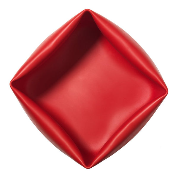 Red square bowl with smooth, glossy surface and unique folded edges. Ideal for stylish dining presentations.