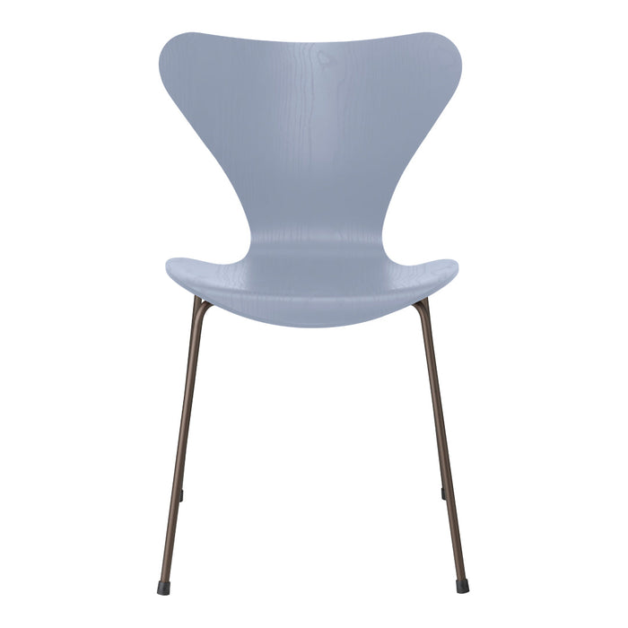 Light gray butterfly chair with a smooth, minimalist design and slim metallic legs. Ideal for modern decor.