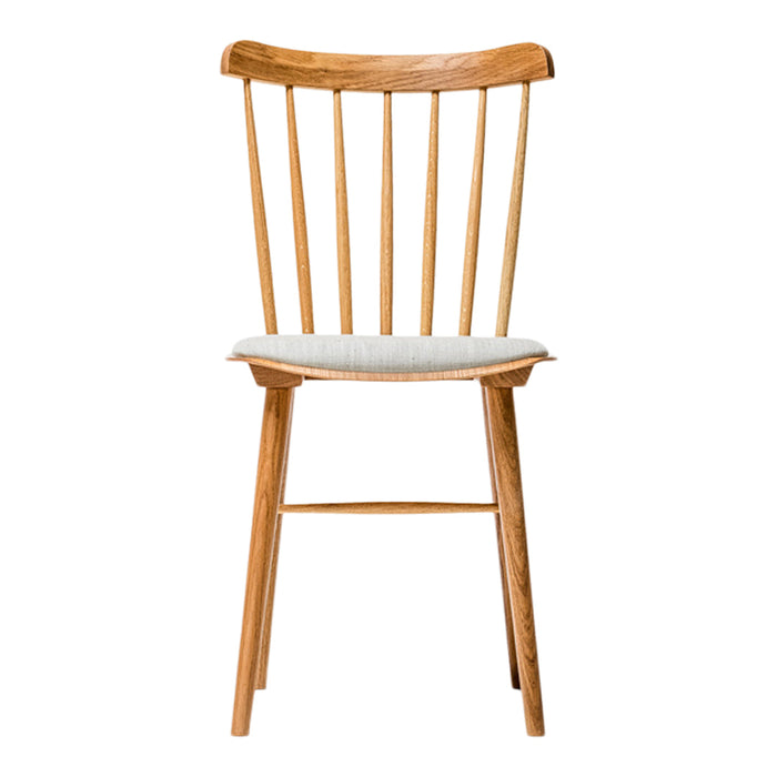 Natural wood chair with a light beige cushion and simple, clean lines. Ideal for modern decor.