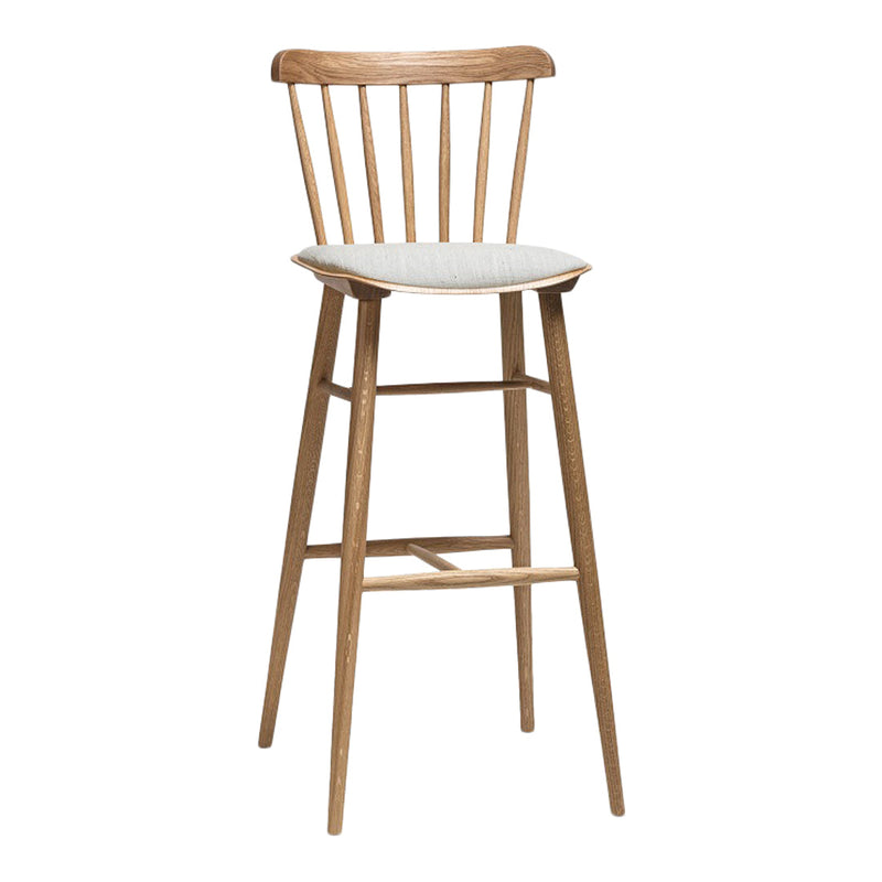 Natural wood bar stool with gray patterned seat, featuring a classic spindle back design.