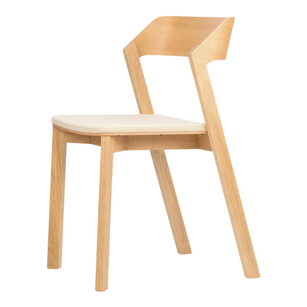 Light wood chair with a minimalist design and a cream-colored seat, showcasing natural tones and clean lines.