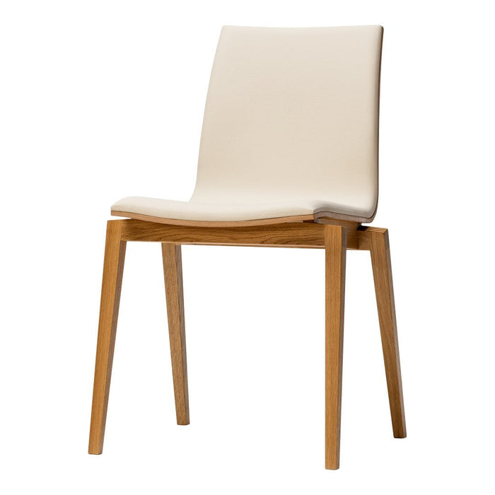 Cream upholstered dining chair with natural wood legs, featuring a sleek, minimalist design. Perfect for modern interiors.