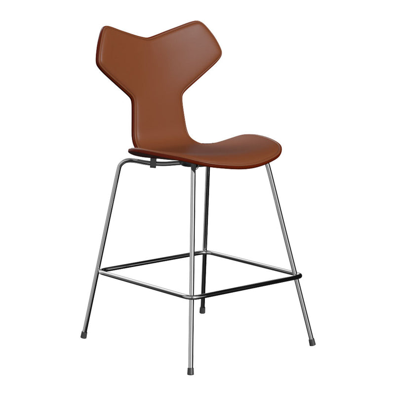 Brown upholstered chair with a unique geometric design and sleek chrome legs, perfect for modern decor.