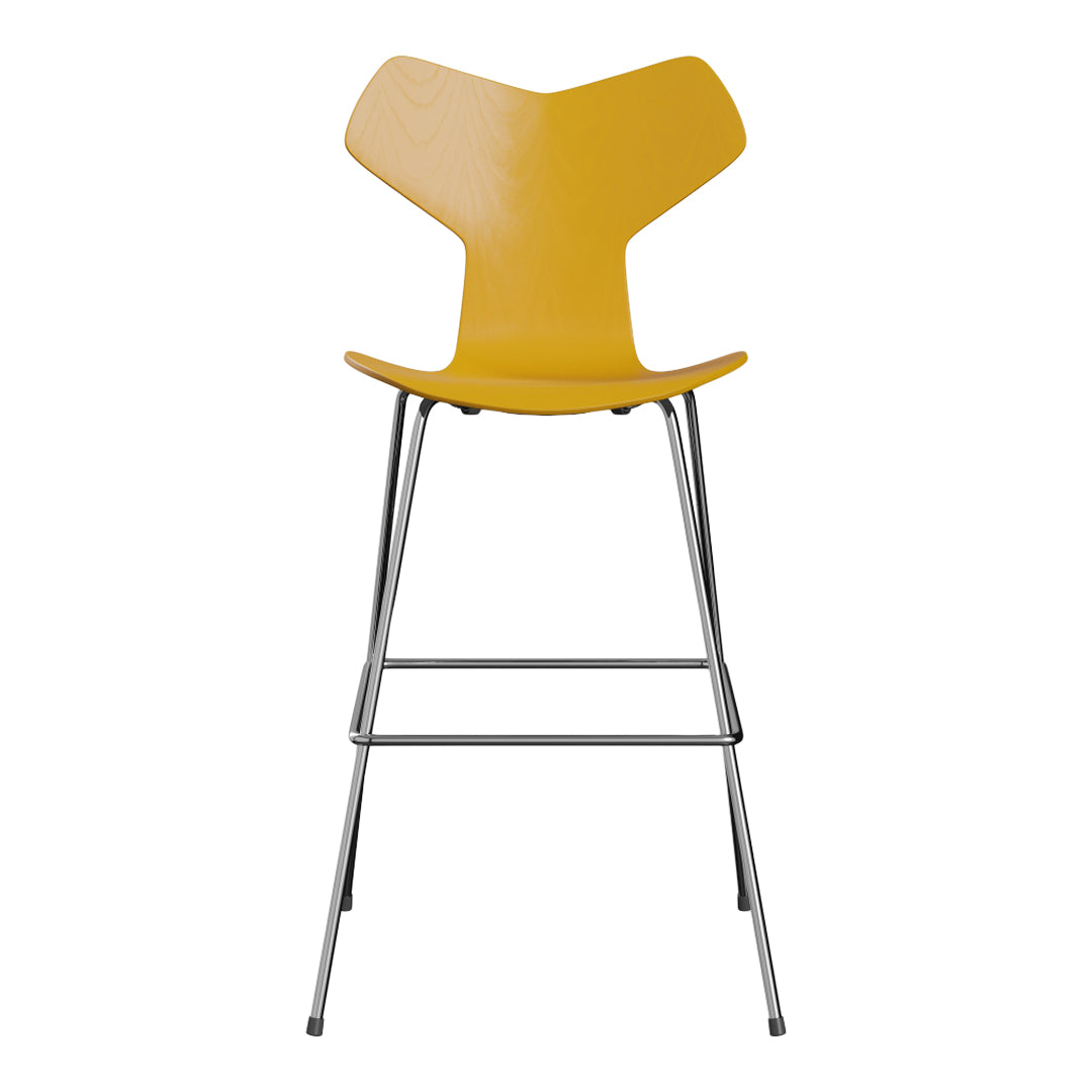 Yellow modern bar stool with a unique angular design and silver metal legs, perfect for contemporary decor.