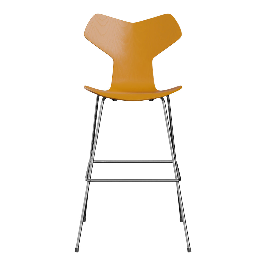 Stylish yellow chair with a unique, modern design and sleek chrome legs, perfect for contemporary spaces.