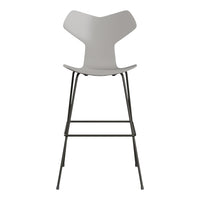 Light gray modern bar stool with sleek black metal legs, featuring a minimalist design. Perfect for contemporary decor.